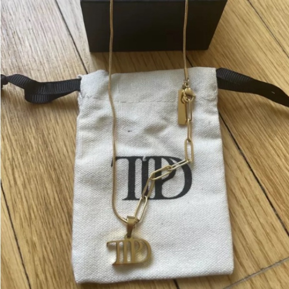 Typed Taylor necklace